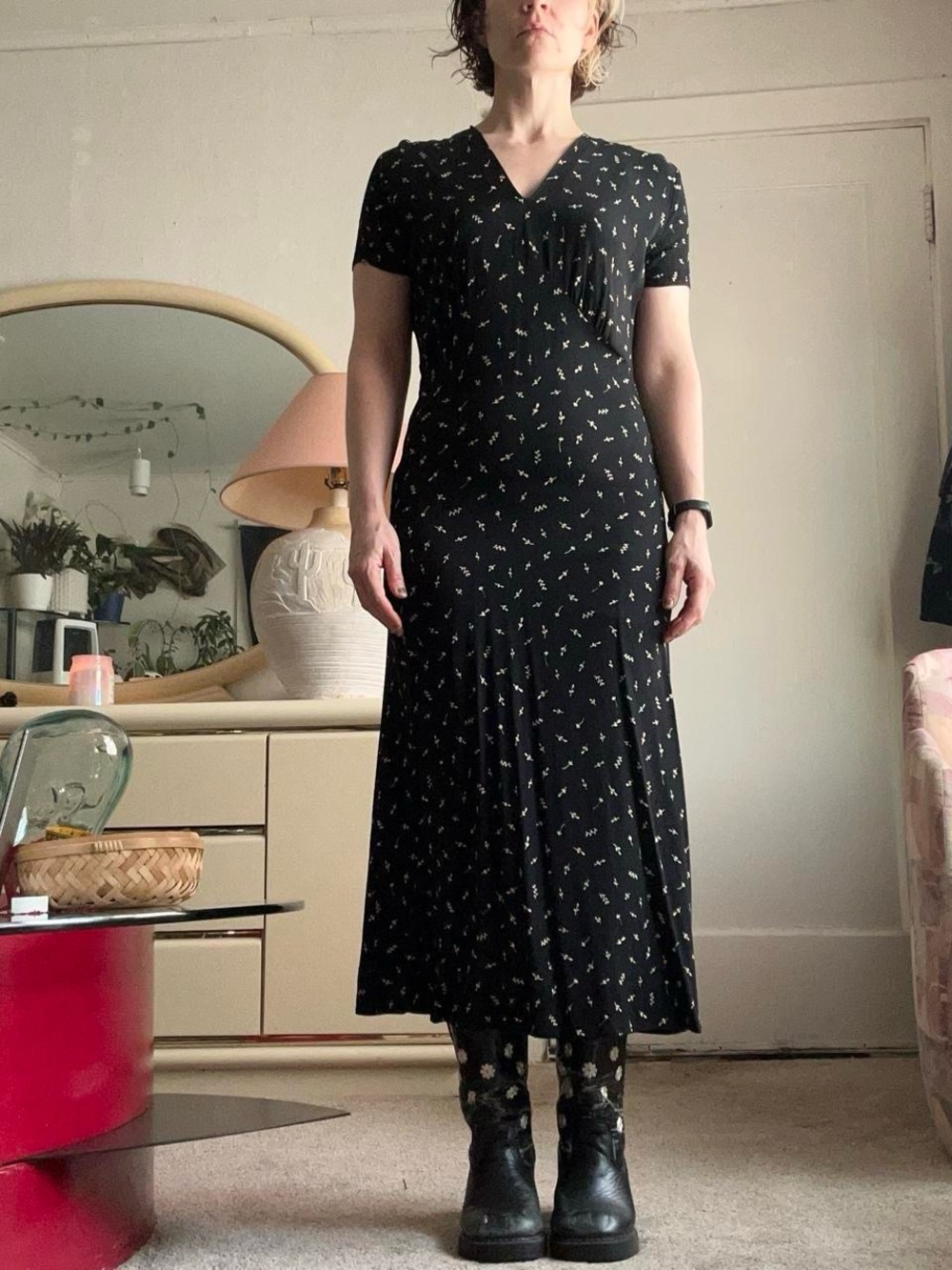90s does 30 Black maxi dress with yellow floral pattern and a V-neckline